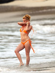 NICOLETTE-SHERIDAN-in-Bikini-Working-Out-on-the-Beach-in-St.-Barts-22.jpg
