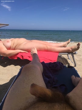 At the nudist beach couple